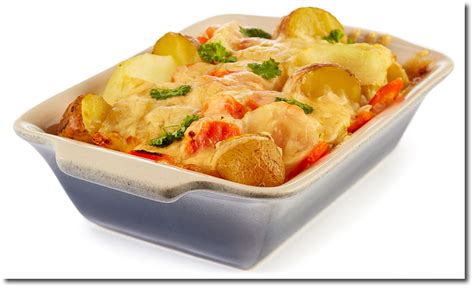 Kartoffeln, kohlrabi und schinken abwechselnd einschichten. Kohlrabi Kartoffel Auflauf Rezept