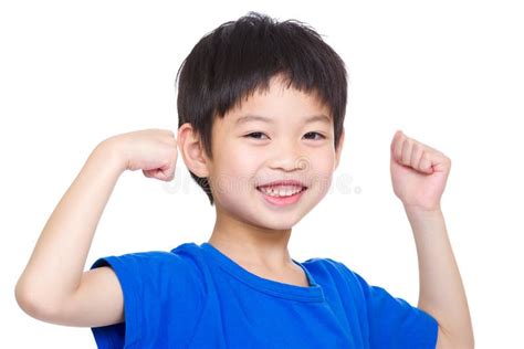Smiling Sport Child Boy Showing Hand Biceps Muscles Strength Stock