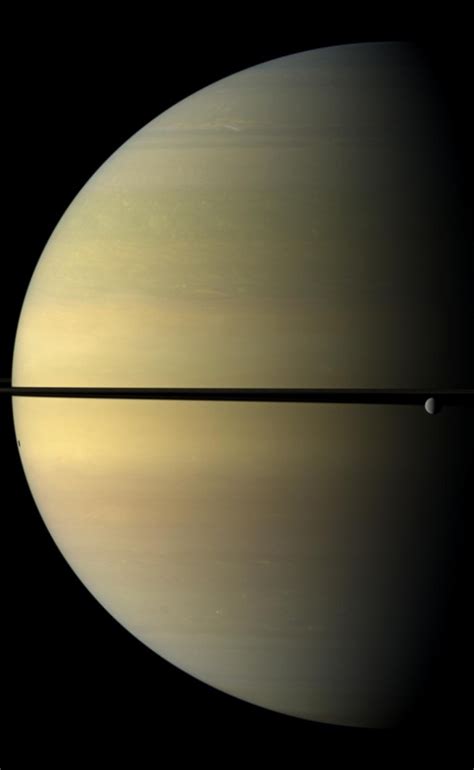 Saturn Dwarfs The Icy Moon Rhea International Space Fellowship