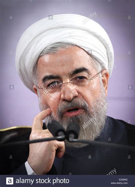 tehran iran 14th june 2014 iranian president hassan rouhani reacts during a press conference