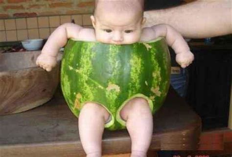 Funny Photos Baby On Water Melon