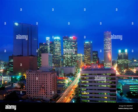Downtown Los Angeles Skyline With High Rise Buildings And Traffic At
