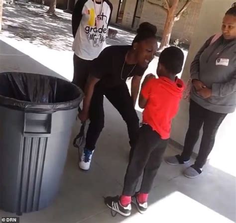 Horrifying moment a mother beats her son, 7, with a belt and threatens