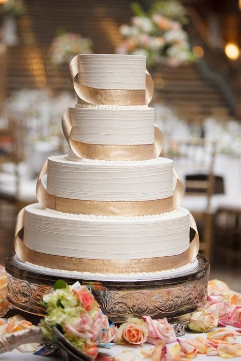 Nowadays many cake shops offer wedding cakes in many styles to fulfill the desire for a beautiful wedding cake. Ivory Wedding Cake, Gold Ribbon