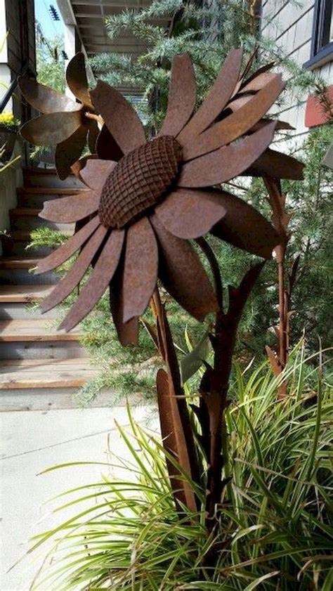 It can be on a grand scale full of trees and lawn ornaments or an intimate window box overflowing with color. 70 Awesome Metal Garden Art Design Ideas For Summer (7 ...