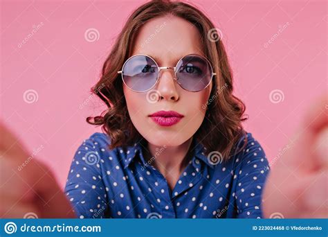 Funny Young Woman With Bright Makeup Making Selfie In Studio Indoor