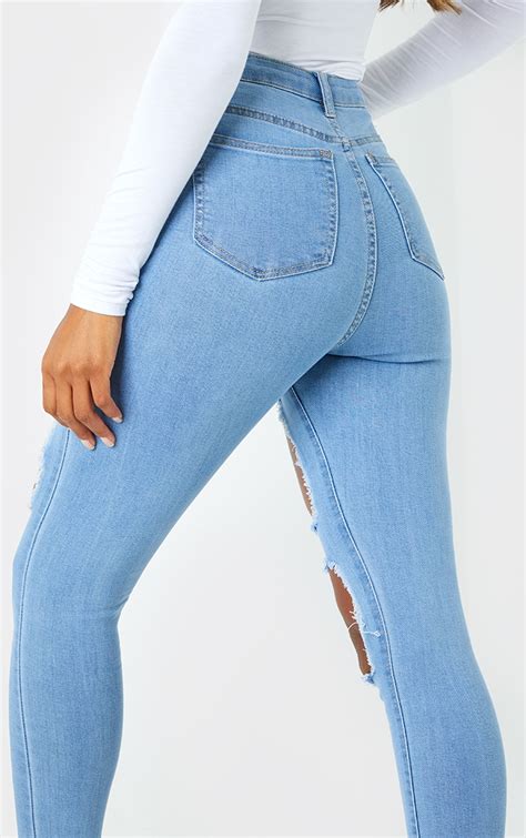 Light Wash Open Thigh Ripped Skinny Jeans Prettylittlething