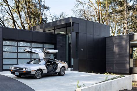 Black Wood And Glass Volumes Form Royal House In Oregon Woodland On