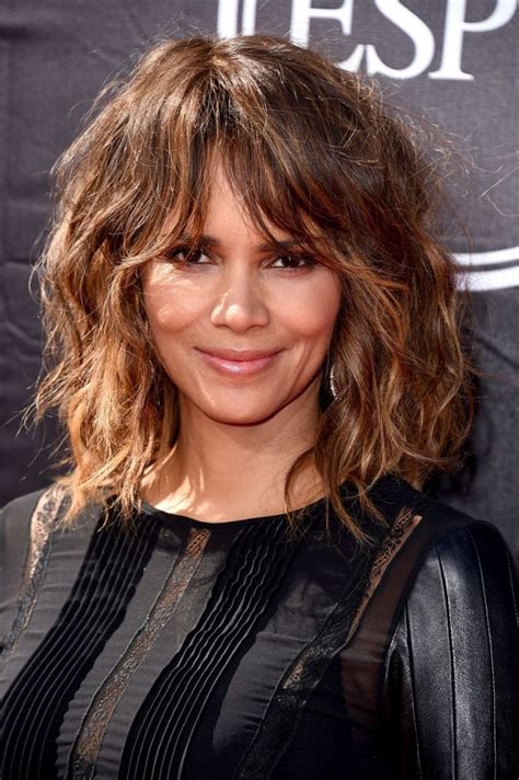 Pair your long waves with a thick fringe. 15 Gorgeous Fringe Hairstyles For Women - Haircuts ...