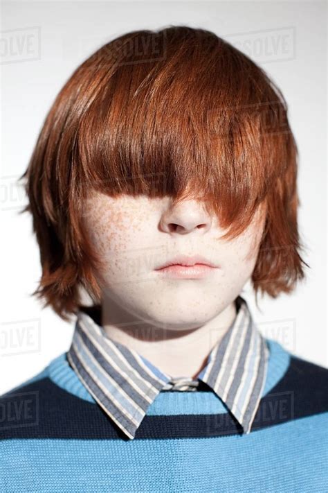 Boy With Hair Covering His Eyes Stock Photo Dissolve