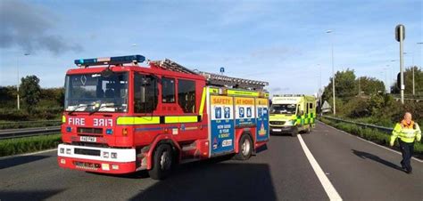 firefighters help rescue trapped lorry driver after collision involving two hgvs