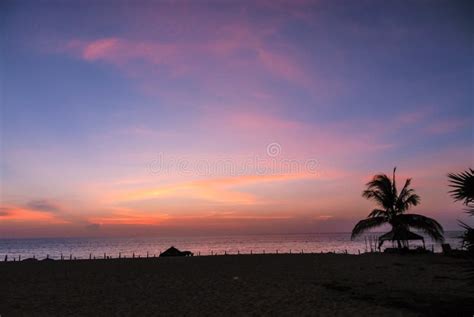 Romantic Pink Orange And Blue Sunset Over Beach In Thailand Stock Image