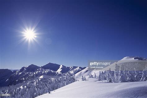 Beautiful Winter Mountain Scene Under Bright Sun Stock