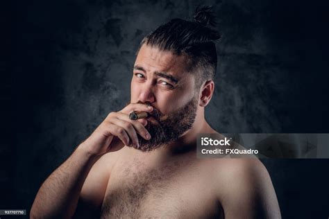 Bearded Male Smoking A Cigarette Stock Photo Download Image Now
