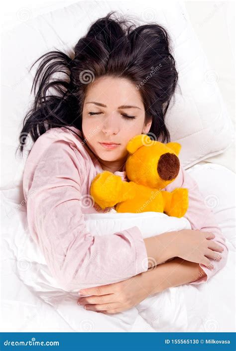 A Girl Sleeping With Teddy Bear In The Bed Stock Photo Image Of