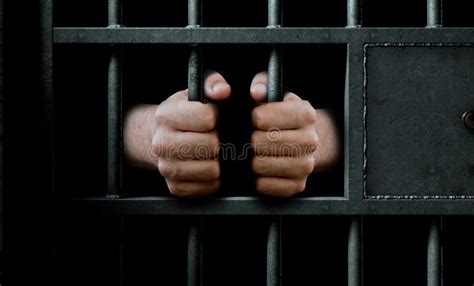 Jail Cell Door And Hands Stock Image Image Of Lockup 104319611