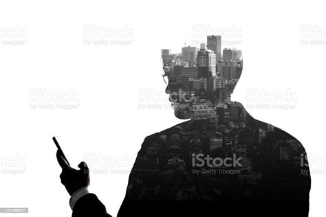 Double Exposure Businessman Use Mobile Phone And Skyscraper Building