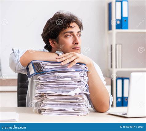 Overloaded Busy Employee With Too Much Work And Paperwork Stock Image