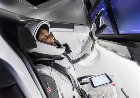 Spacex Releases Photo Of Nasa Astronauts Testing In Crew Dragon Spaceship