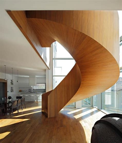 Concrete Circular Stairwell Focus Of Minimalist Residence Wooden