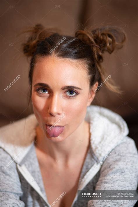 Portrait Of Young Woman Sticking Out Tongue — Beautiful Braid Stock