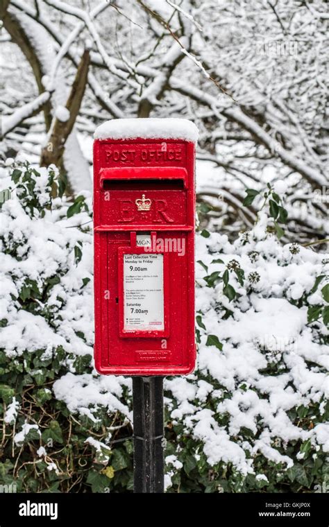 Postbox In The Snow Stock Photo Alamy