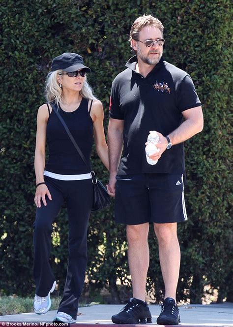 russell crowe scoops wife danielle spencer into arms after 14 hour flight daily mail online