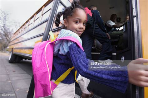 Kids Boarding School Bus High Res Stock Photo Getty Images