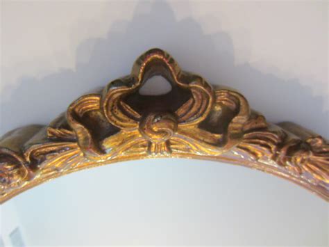 Vintage carolina mirror company gold octagonal beveled glass wall mirror speakingofwitchshop 5 out of 5 stars (159) $ 150.00. Carolina Mirror Company Round Mirror with Floral Bow Crest ...