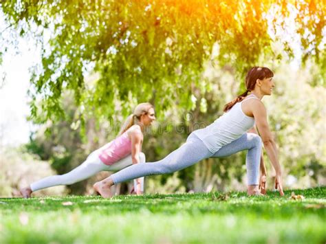 Young Women Exercising In The Park Stock Image Image Of Happy