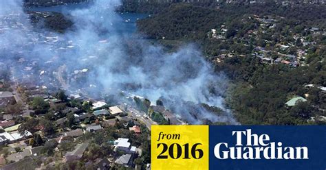 dozens of bushfires burn across new south wales as crews battle high winds bushfires the