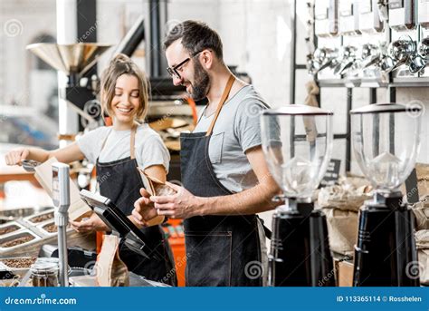Coffee Sellers Working In The Shop Stock Photo Image Of Male
