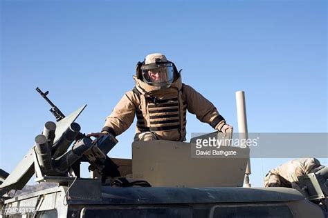A Humvee Turret Gunner Suits Up In Newly Issued Full Body Armor To Go
