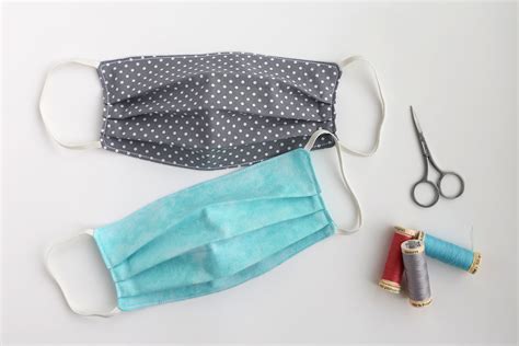 Free face mask pattern for sewing pleated fabric face masks with diy fabric ties or elastic loops. How to make a Face Mask to help Health Care Providers - It's Always Autumn