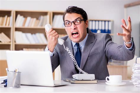 The Angry Businessman with Too Much Work in Office Stock Photo - Image ...