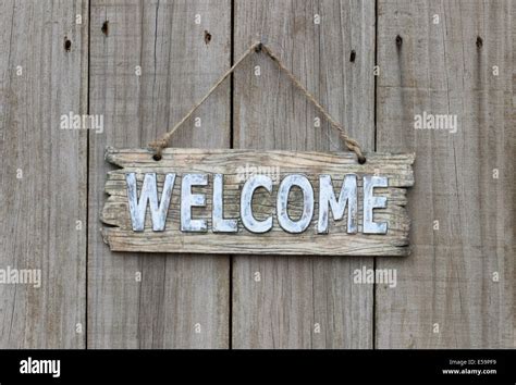 Rustic Wood Welcome Sign Hanging On Wooden Background Stock Photo Alamy
