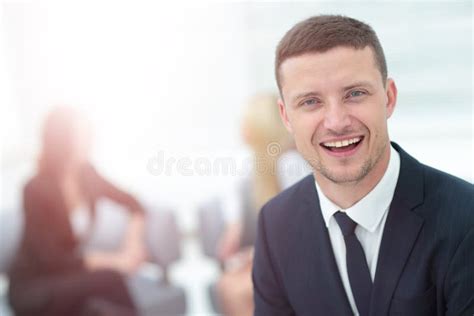 Face Of Handsome Businessman On The Background Of Business Peopl Stock