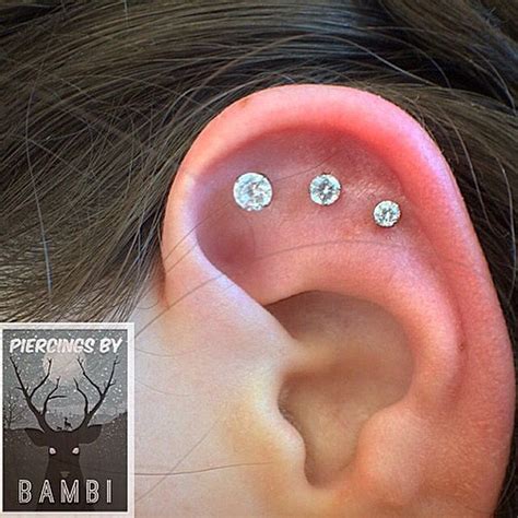 Elegant And Classy Triple Flat Piercing Using Mm Mm And Mm