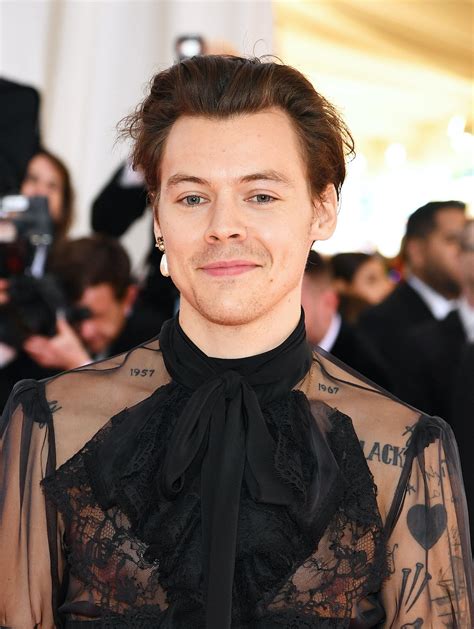 Harry Styles 2019 Met Gala Outfit Included A Sheer Jumpsuit Pearl Earrings And Heels