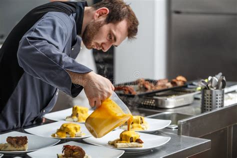 Chef Pouring Gamy Sauce Stock Photo Image Of Chef Food 87344344