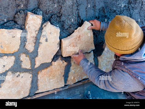 Worker Stuck Stone Cladding On The Outside Facade Stock Photo Alamy
