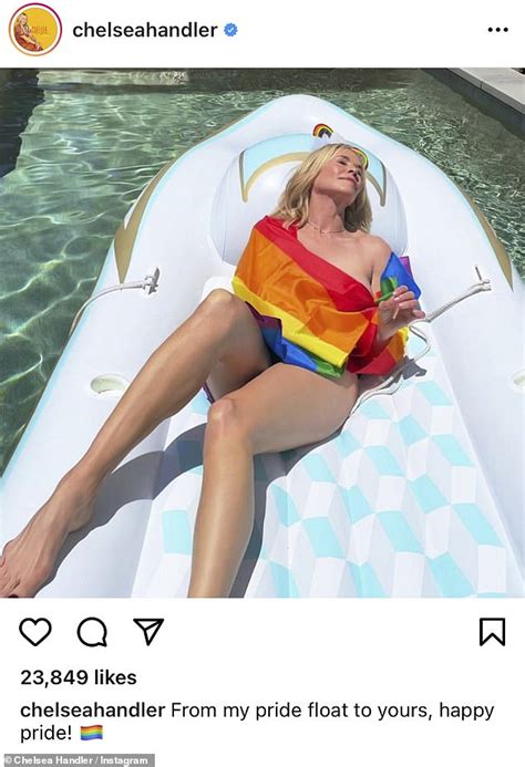 Chelsea Handler Reclines Naked On Pool Inflatable Wrapped In Rainbow