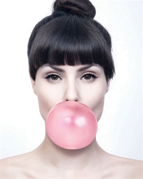 Woman Blowing Bubble Gum In Studio · Free Stock Photo