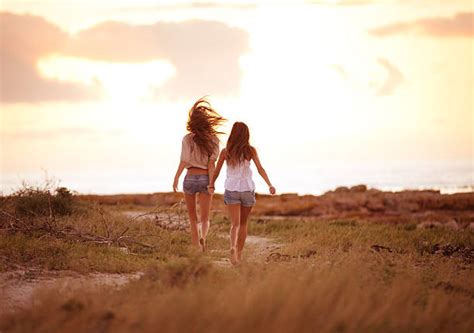 Two Girls Holding Hands Stock Photos Pictures And Royalty Free Images