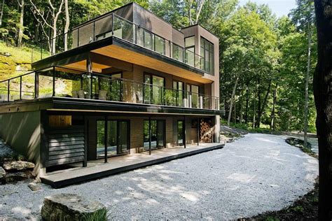 Elegance Modern House In Forest Design With Glass Wall Decor Including