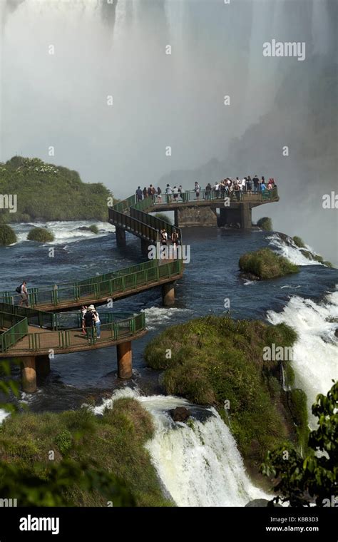 Tourists On Viewing Platform On Brazil Side Of Iguazu Falls Brazil