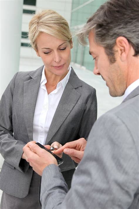 Business People Exchanging Numbers Stock Image Image Of Contract