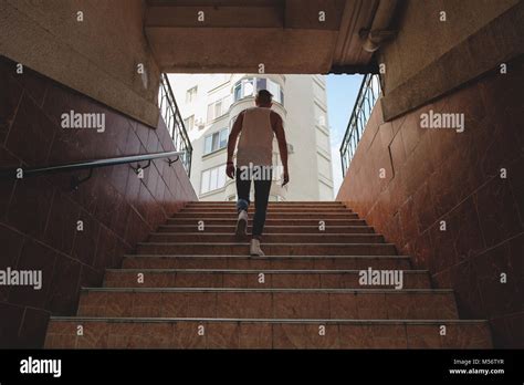 Man Climbing Stairs High Resolution Stock Photography And Images Alamy