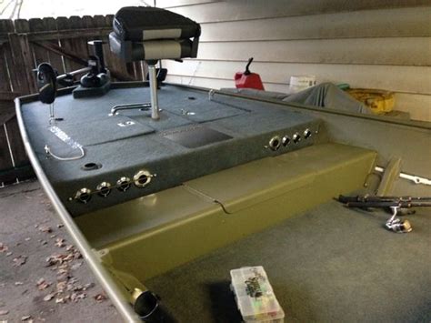 Convert jon boat bench seat to dry storage. Front of boat. Storage, cup holders, rod holders, light ...