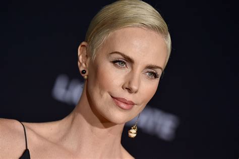 charlize theron is not ashamed to talk about her mother killing her fatherhellogiggles